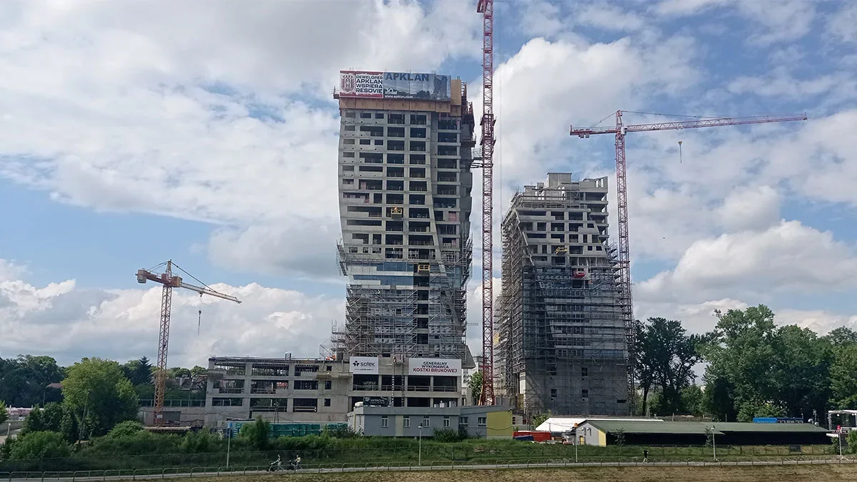 Olszynki Park - niższy budynek, adres: ul. Szopena 35C. Wysokość: planowane 78 metrów. Stan: w budowie, ma zostać ukończony w 2023 roku.